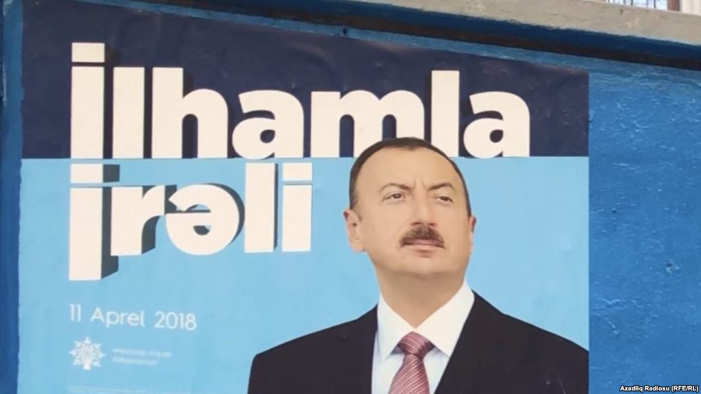 An election campaign poster for Azerbaijani President Ilham Aliyev, who is expected to easily win a new term of office this week.
