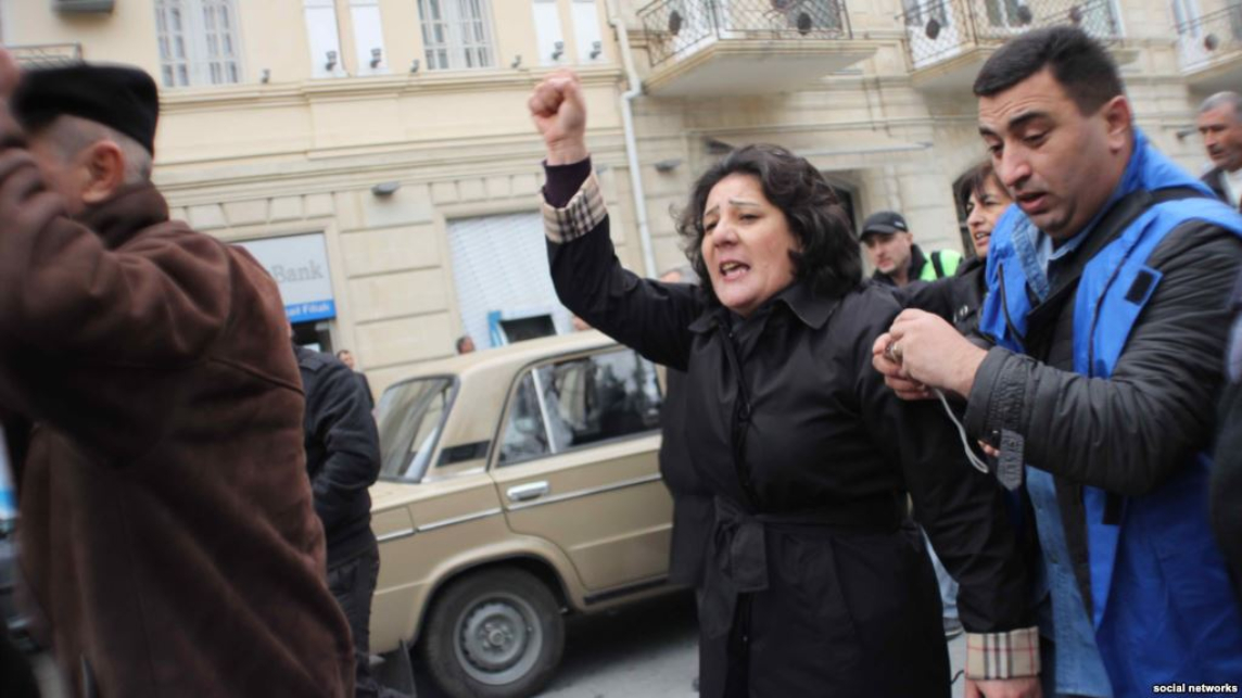 Azerbaijani opposition activist Gozal Bayramli insists that the banknotes were planted in her bag.