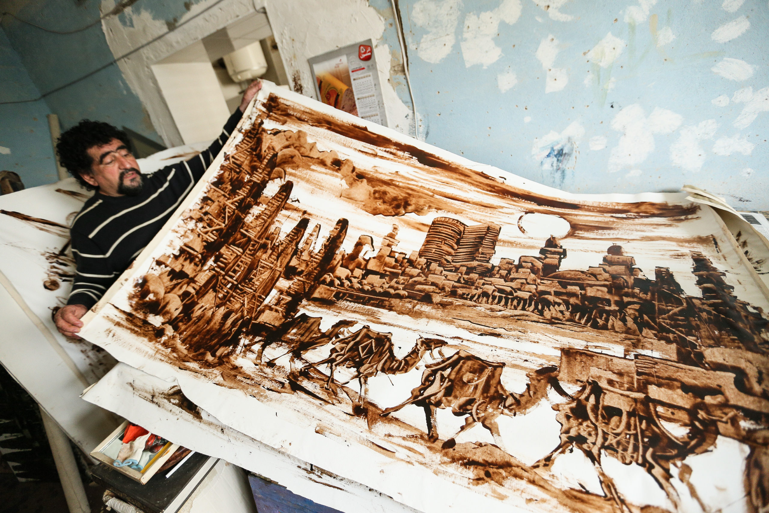 Displaying one of his works, he says it generally takes him 3 – 4 days to complete a painting. Sometimes, it can take him as much as one week.