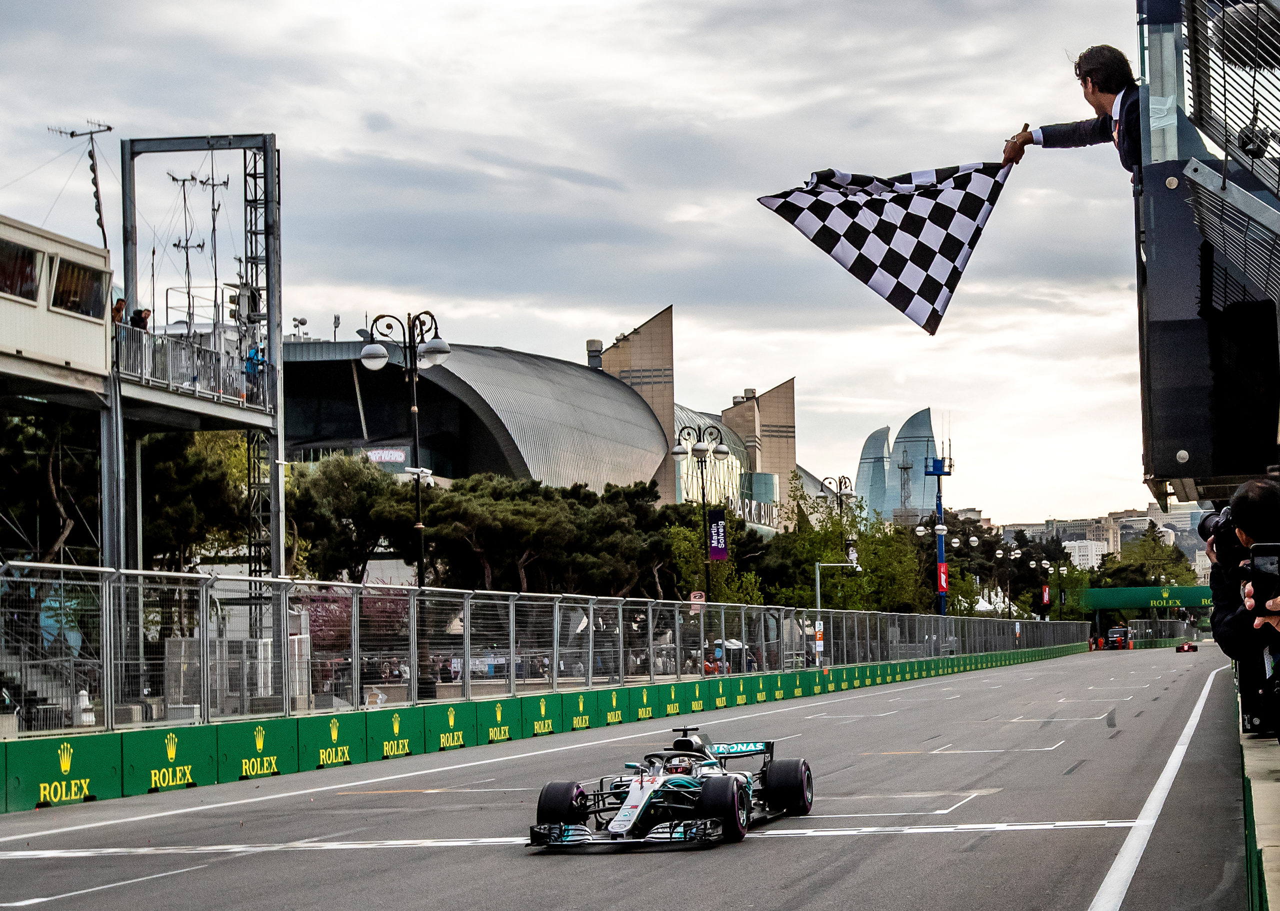 Formula One – F1 – Azerbaijan Grand Prix – Baku City Circuit, Baku, Azerbaijan – April 29, 2018   Mercedes’ Lewis Hamilton crosses the finish line to win the race   Srdjan Suki/Pool via Reuters