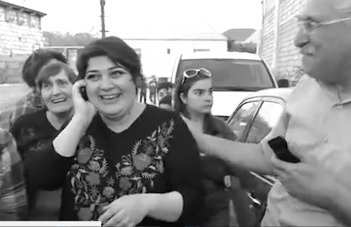 Khadija Ismayilova returns home after her release (on probation) in May 2015. In September 2015, the acclaimed investigative journalist was sentenced to seven and a half years in prison on charges of fraud and tax evasion. Image still via YouTube / Turan