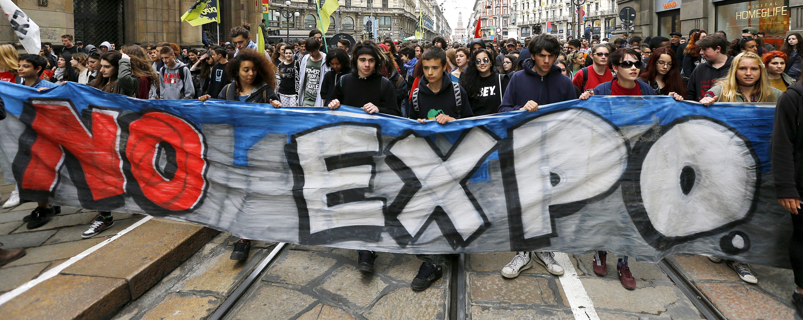 Protesters hold a banner reading “No Expo” during a rally against Expo 2015 in Milan, Italy, 30 April 2015 (REUTERS/Stefano Rellandini)