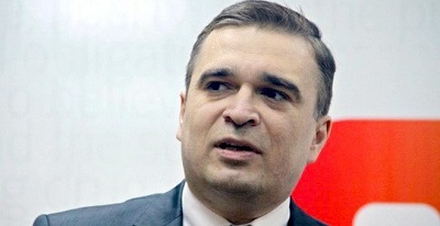 Ilgar Mammadov being driven away in a police car on the day of his arrest. February 2013. (Photo: Aziz Karimov)