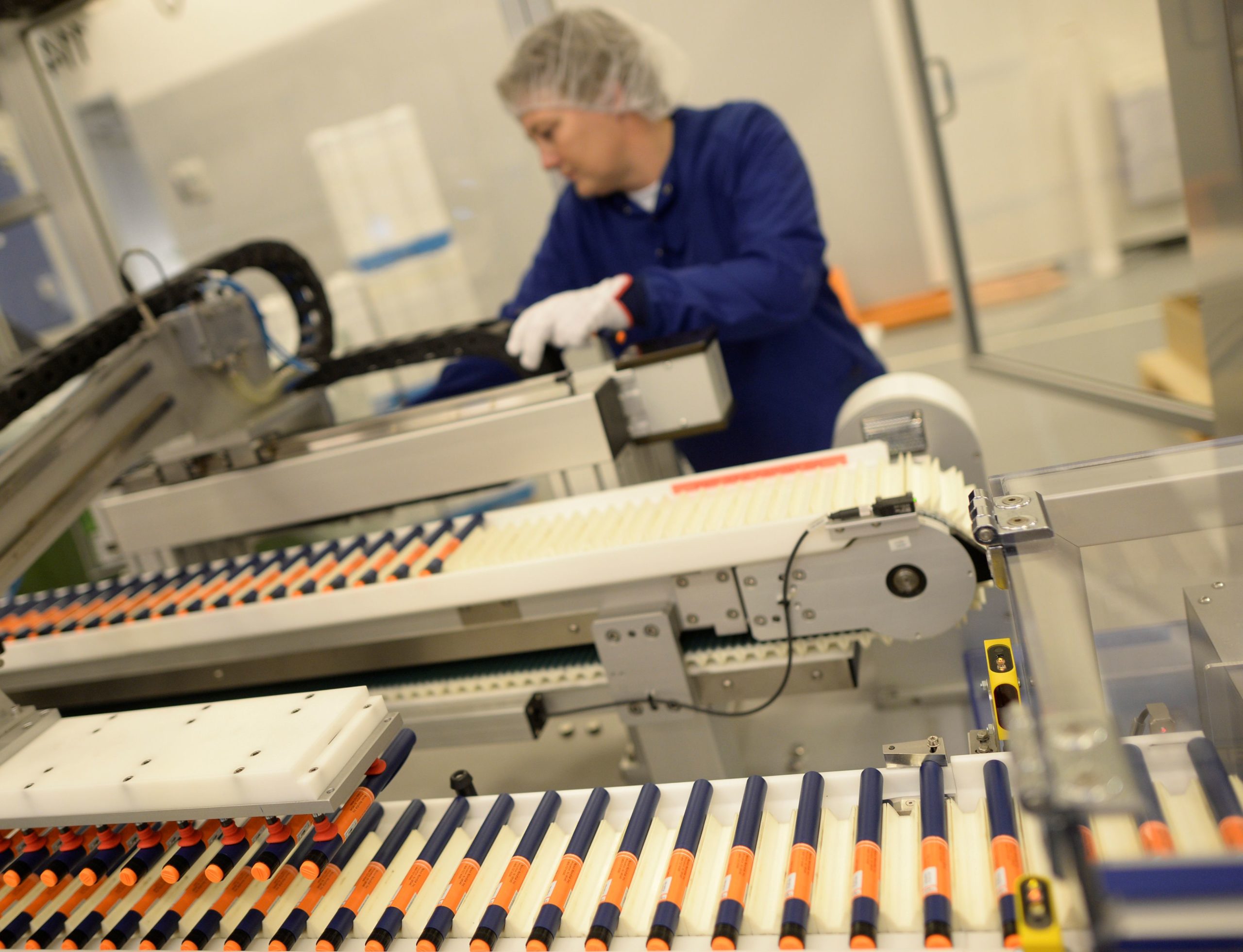 A Novo Nordisk employee controls a machine at an insulin production line. REUTERS/Fabian Bimmer