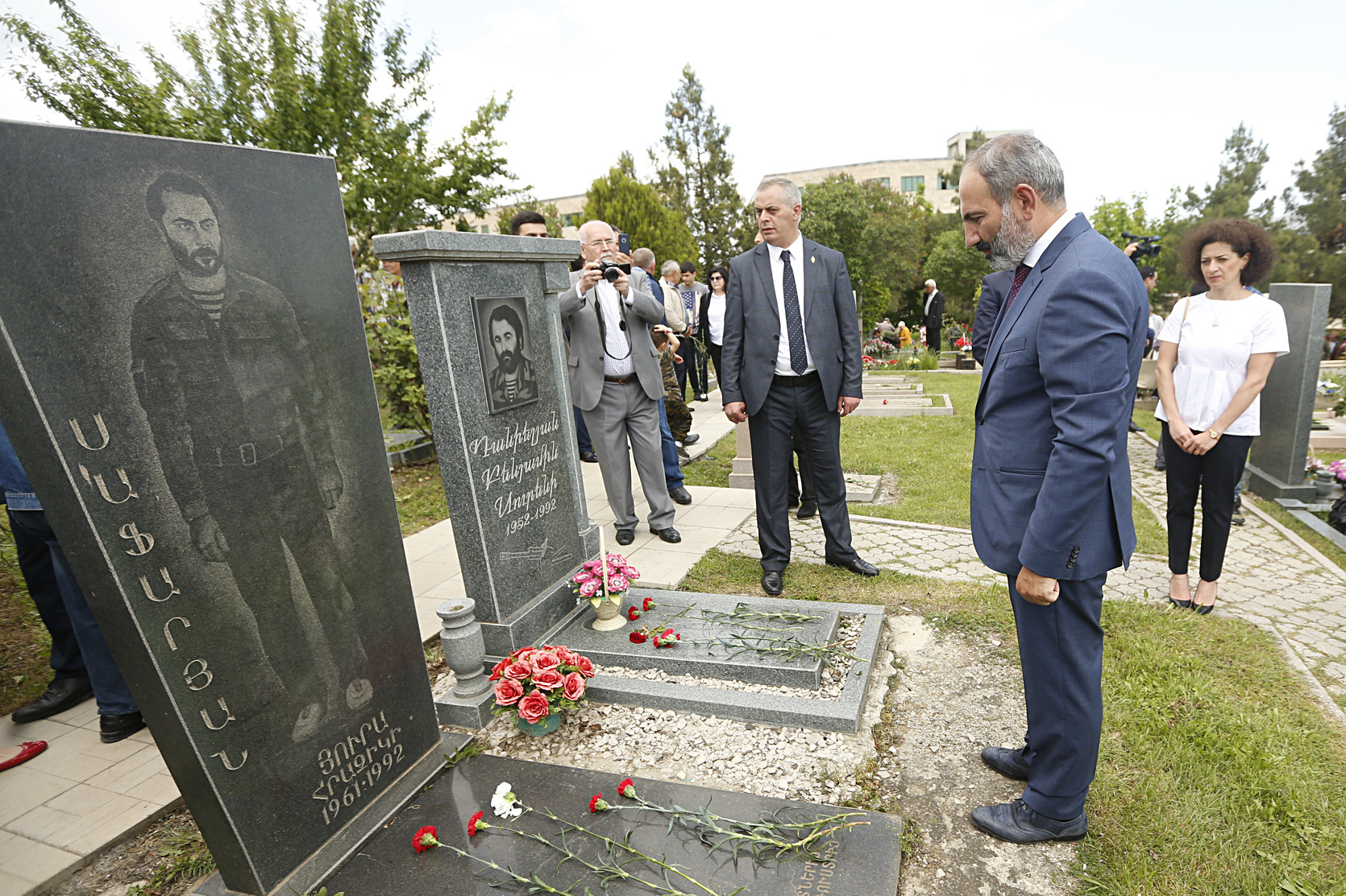 Armenian Prime Minister Nikol Pashinyan visits the grave of an Armenian soldier killed in the Nagorno-Karabakh conflict with Azerbaijan. Azerbaijan reacted variously to Pashinyan's big win in parliamentary elections December 9. (photo: primeminister.am)