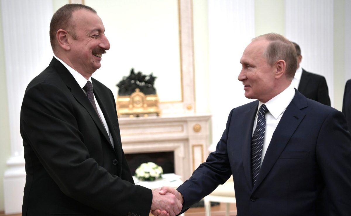 President Ilham Aliyev of Azerbaijan shakes hands with President Vladimir Putin of Russia at the Kremlin in June 2018.
