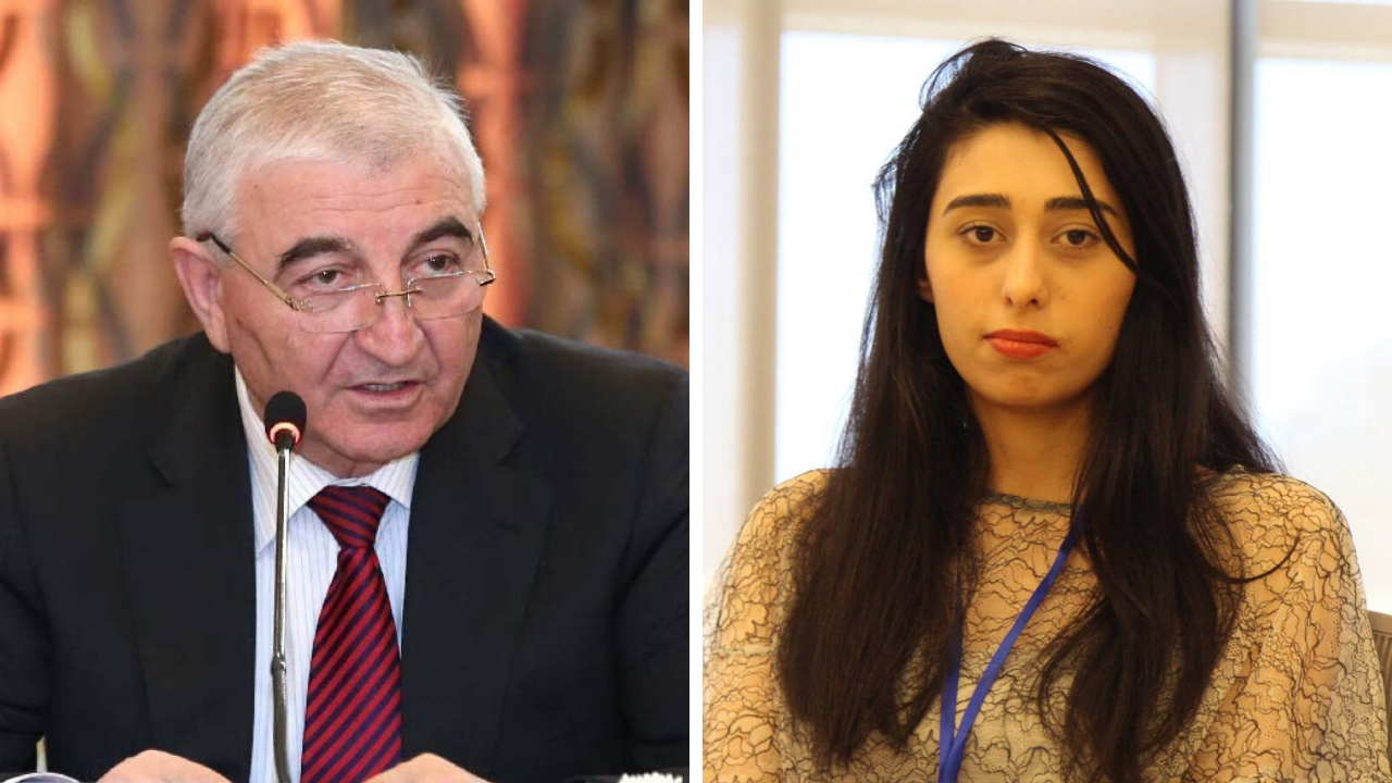 Central Election Commission head Mazahir Panahov and independent election observer Zhala Bayramova (R)