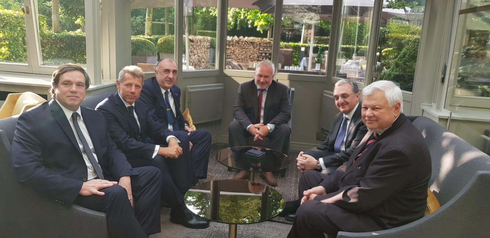 Azerbaijani Foreign Minister Elmar Mammadyarov is seen with his Armenian counterpart and OSCE Minsk Group co-chairs.