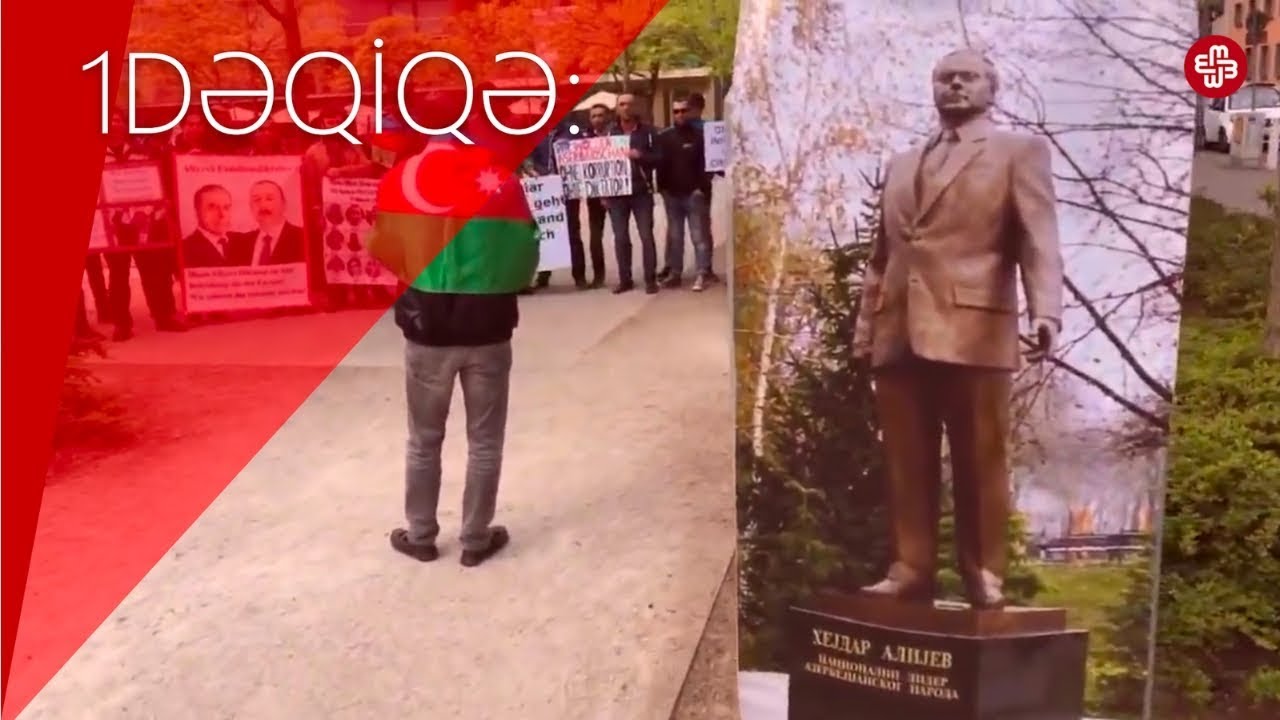 1DƏQİQƏ: Mühacirlər Heydər Əliyevin heykəlinin götürülməsini istəyirlər