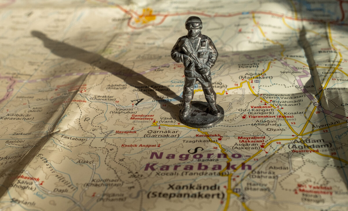 A figurine of an armed soldier on the map of Nagorno-Karabakh.